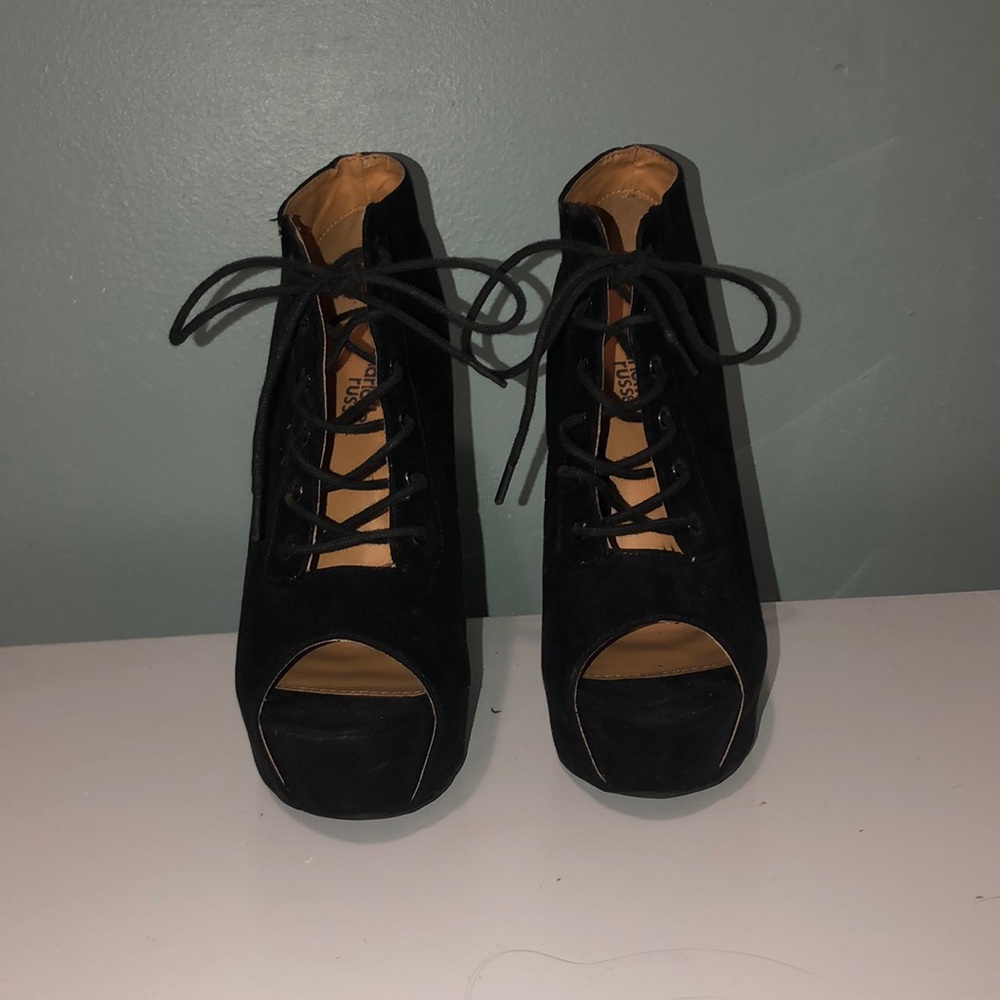 Black suede heels. About 6” heel.